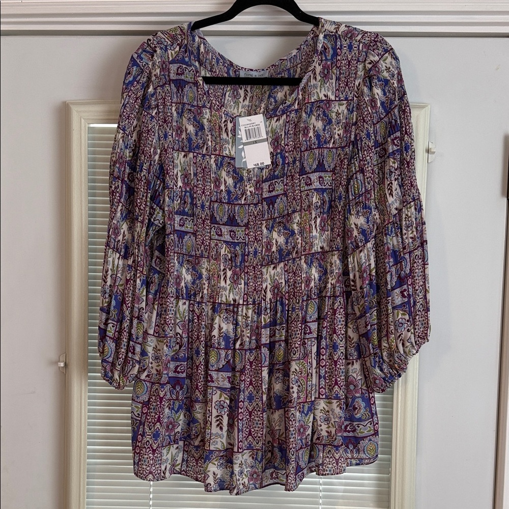 Elegant Women's Blouse with Purple and Cream Patterns
